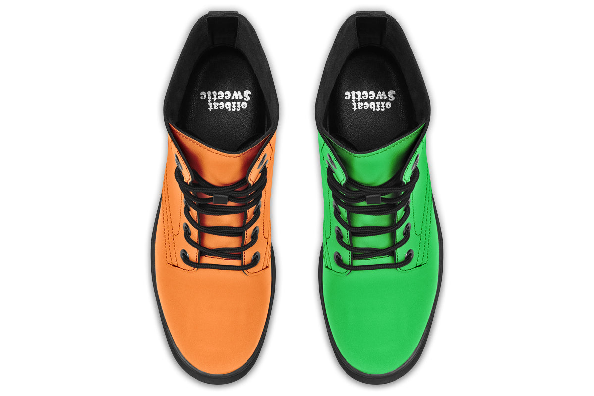 Mismatched boots, one all orange and one all green. Boots have a black sole and black laces.