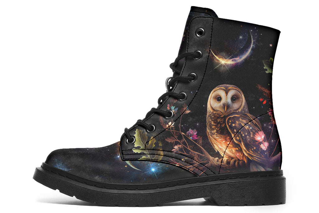Black boots with different owls on each side.