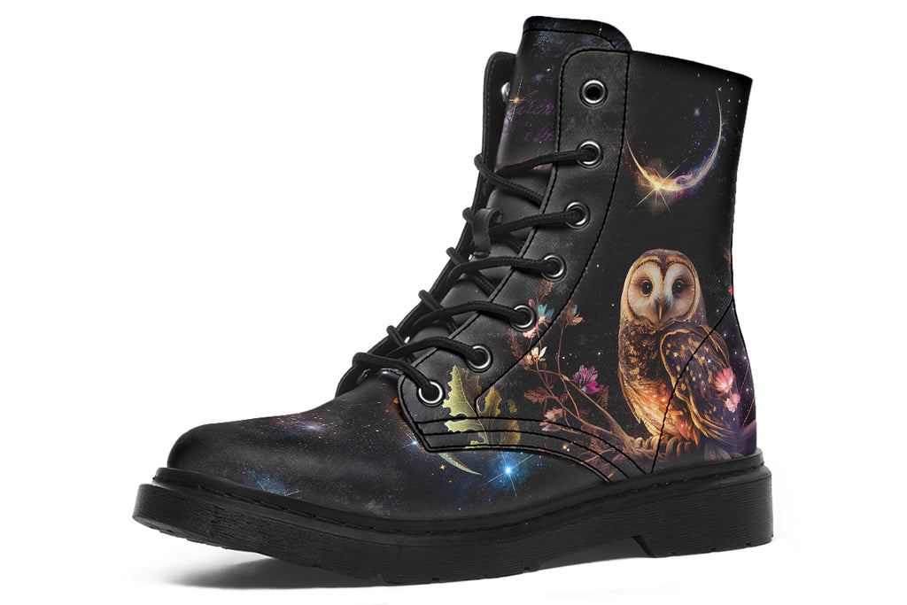Black boots with different owls on each side.