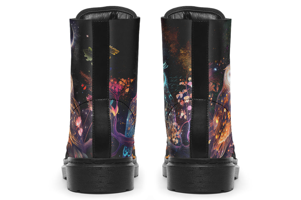 Black boots with different owls on each side.