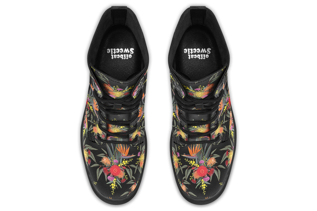 Black boots with a Bird Of Paradise floral pattern.