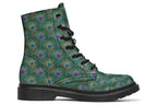 Boots featuring a green peacock feather design. The feathers have pink or blue accents.