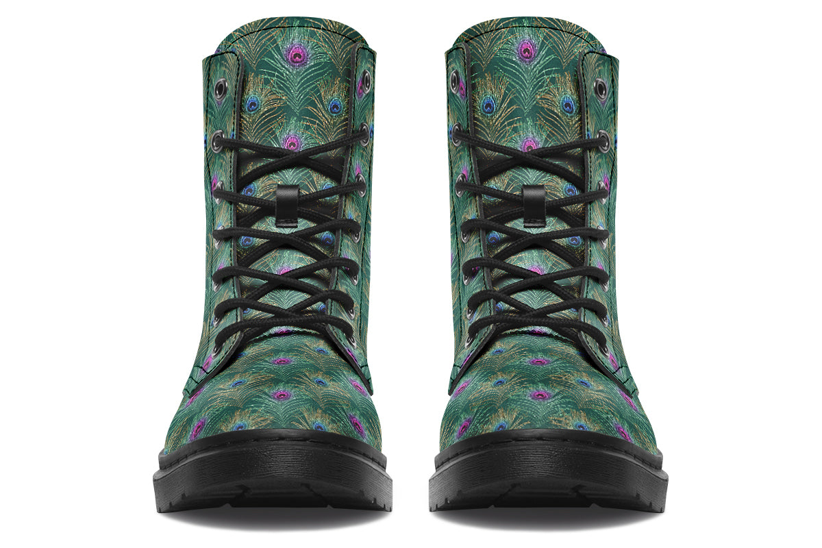 Boots featuring a green peacock feather design. The feathers have pink or blue accents.