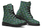 Boots featuring a green peacock feather design. The feathers have pink or blue accents.