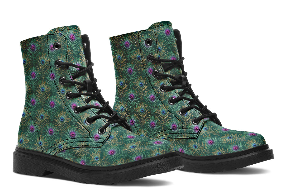 Boots featuring a green peacock feather design. The feathers have pink or blue accents.