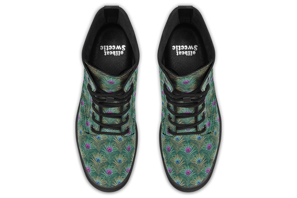 Boots featuring a green peacock feather design. The feathers have pink or blue accents.