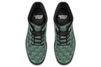 Boots featuring a green peacock feather design. The feathers have pink or blue accents.