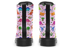 Light pink boots with a pattern of different coloured cute baby dinosaurs, prehistoric-looking trees and dinosaur eggs