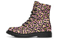 Boots with a textured-looking blush pink background and gold leopard prints