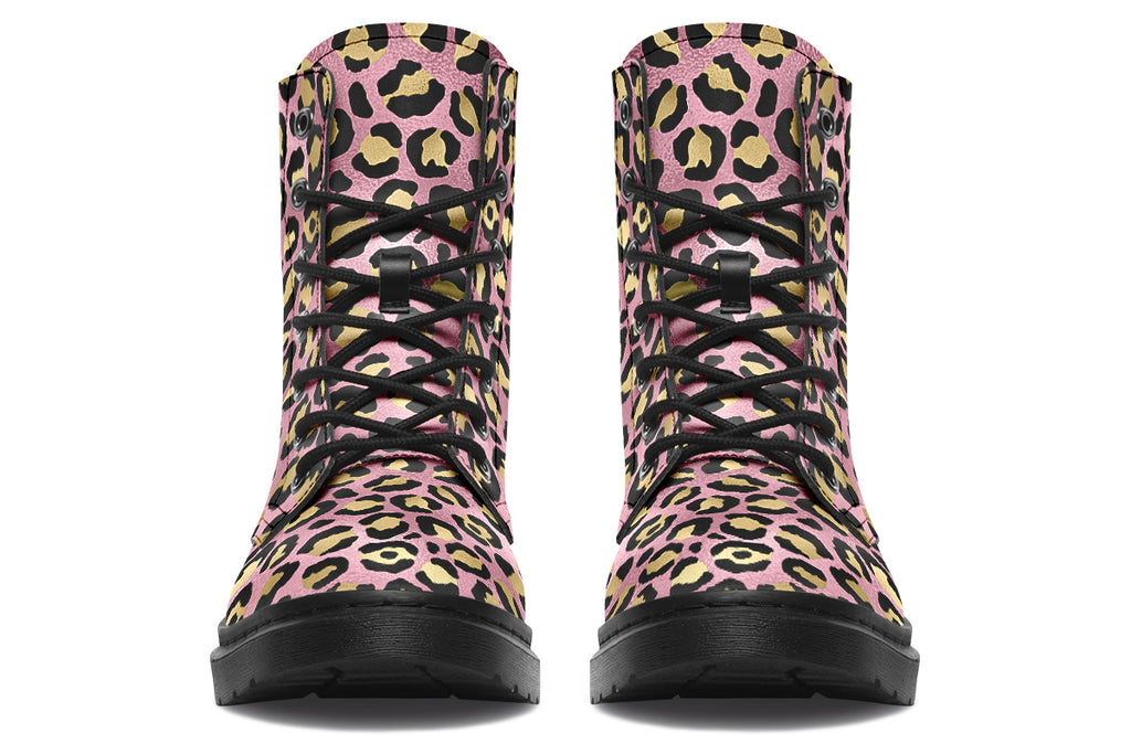 Boots with a textured-looking blush pink background and gold leopard prints