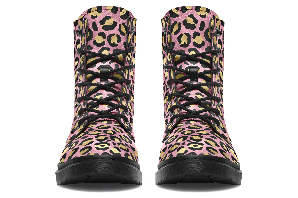 Boots with a textured-looking blush pink background and gold leopard prints