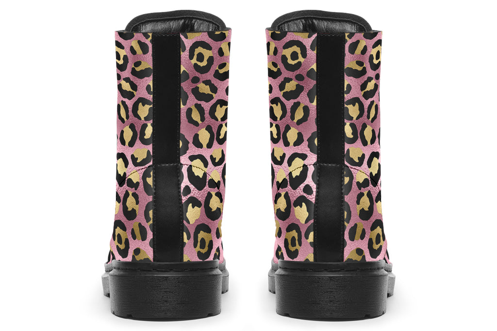 Boots with a textured-looking blush pink background and gold leopard prints