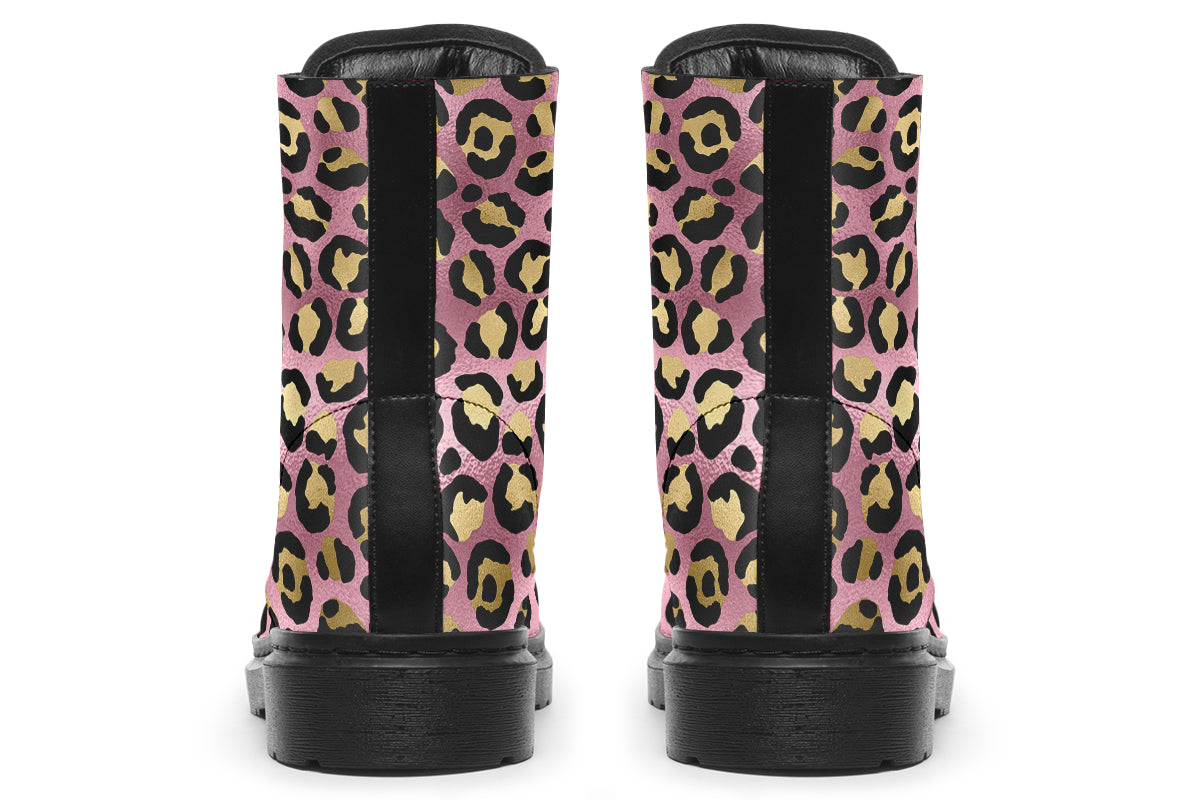 Boots with a textured-looking blush pink background and gold leopard prints