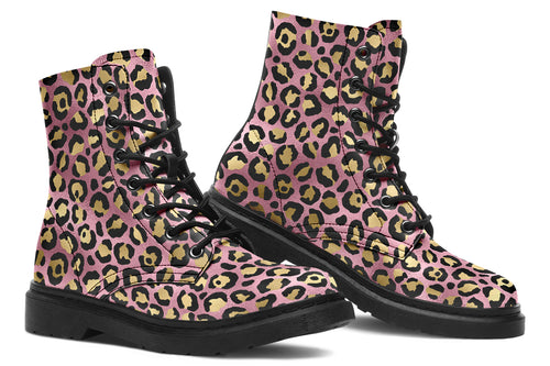 Boots with a textured-looking blush pink background and gold leopard prints