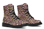 Boots with a textured-looking blush pink background and gold leopard prints