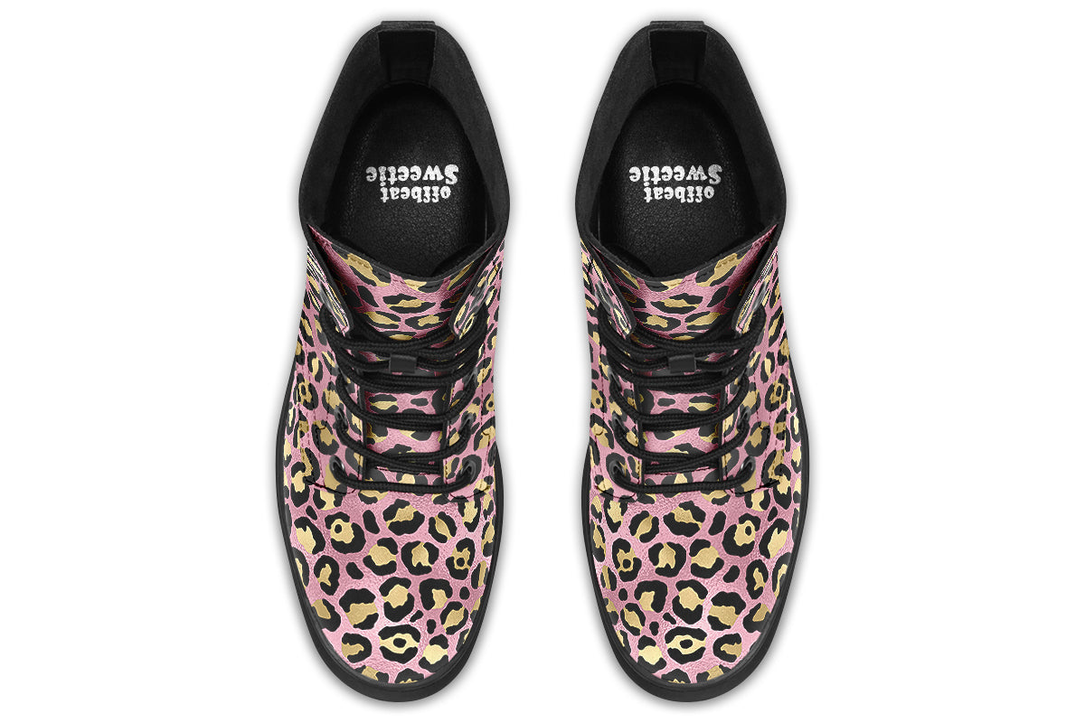 Boots with a textured-looking blush pink background and gold leopard prints