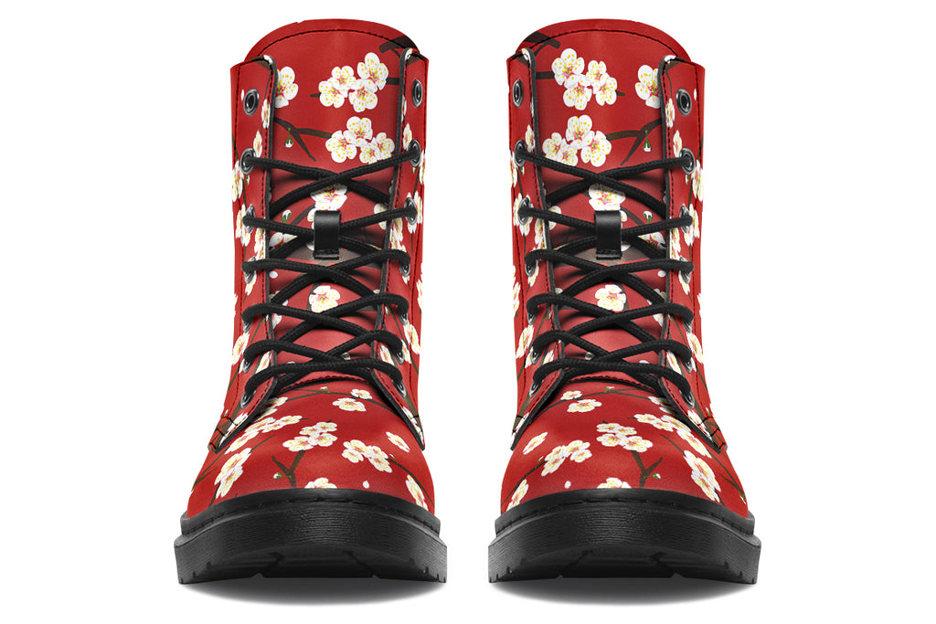 Red boots with white floral pattern
