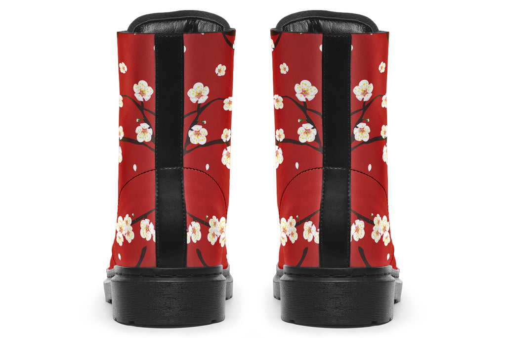 Red boots with white floral pattern