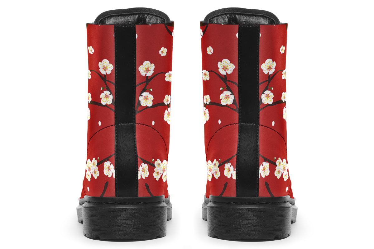 Red boots with white floral pattern