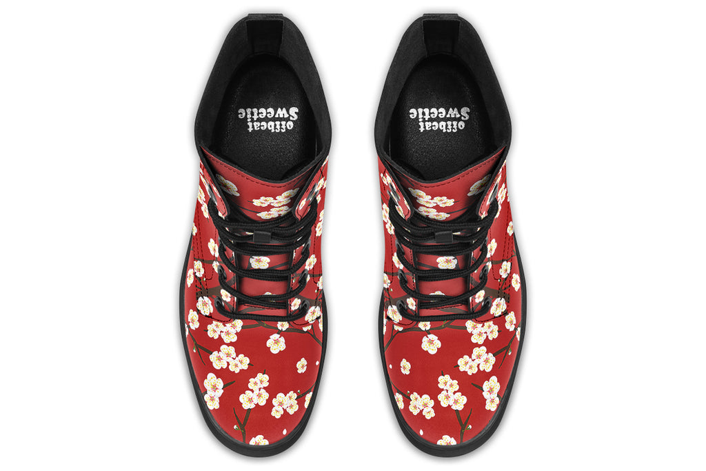 Red boots with white floral pattern