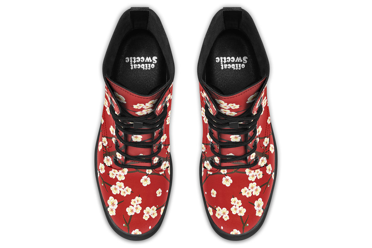Red boots with white floral pattern
