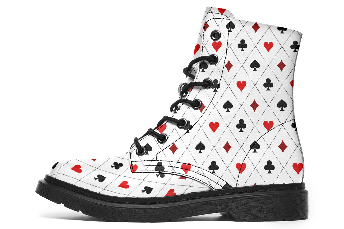 White boots with a black and red pattern of diamonds, hearts, clubs and spades.