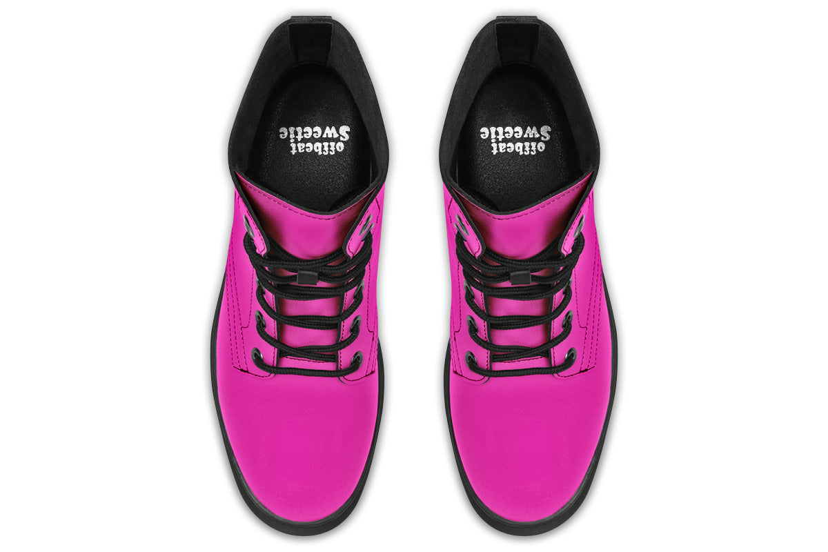 Solid bright pink boots with a black sole.