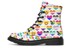 White boots with a pattern of different pride flags in heart shapes all over the boots.