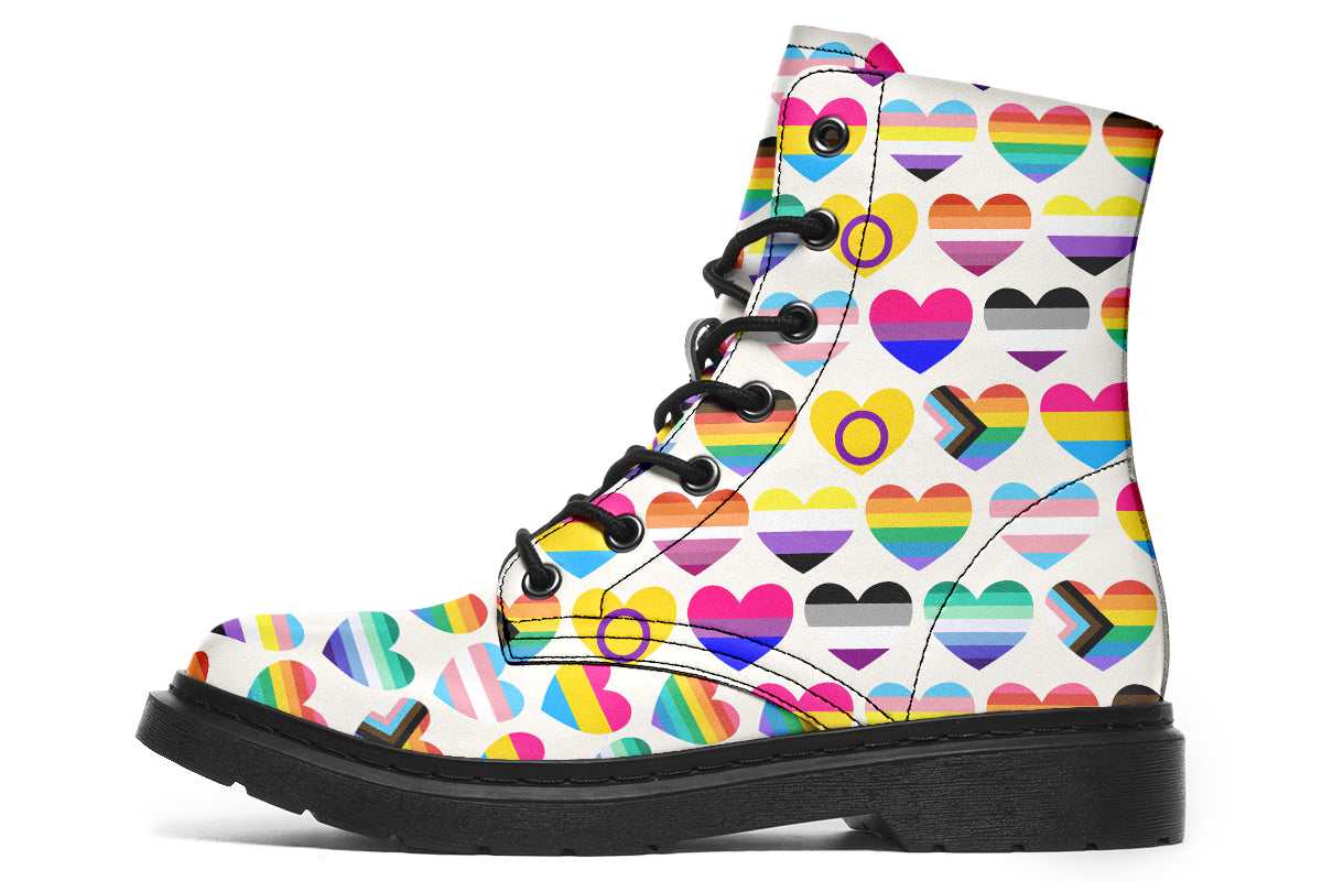 White boots with a pattern of different pride flags in heart shapes all over the boots.