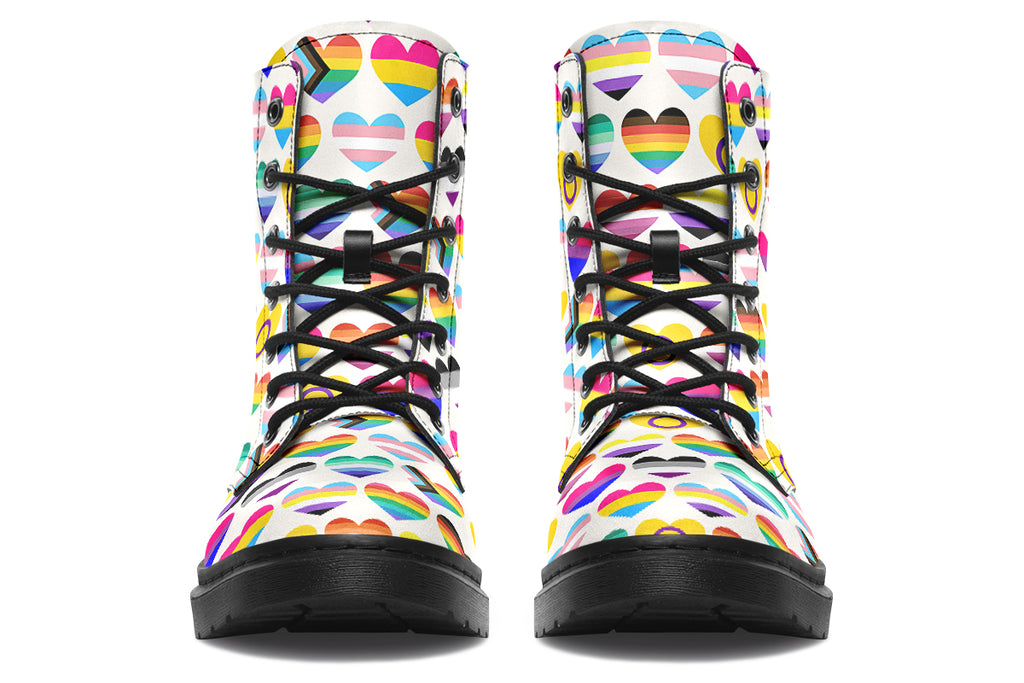 White boots with a pattern of different pride flags in heart shapes all over the boots.
