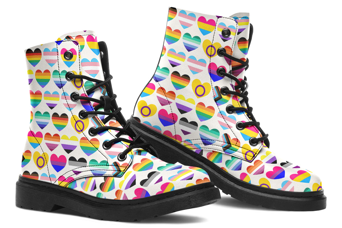 White boots with a pattern of different pride flags in heart shapes all over the boots.