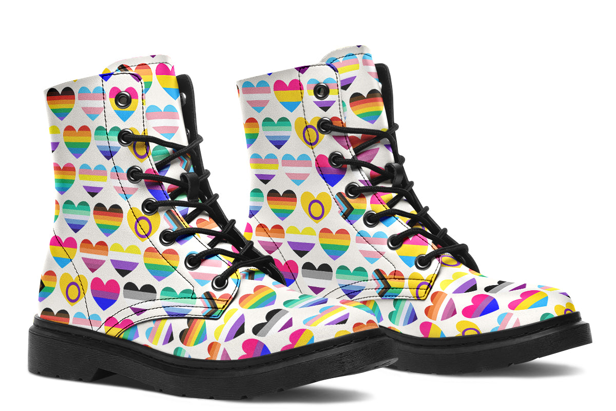 White boots with a pattern of different pride flags in heart shapes all over the boots.