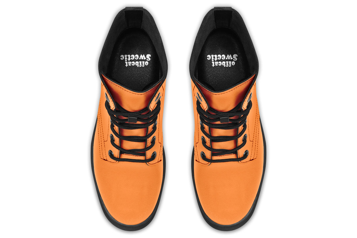 Solid orange boots with a black sole.