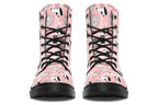 Design features white dogs and love hearts on a soft pink background.