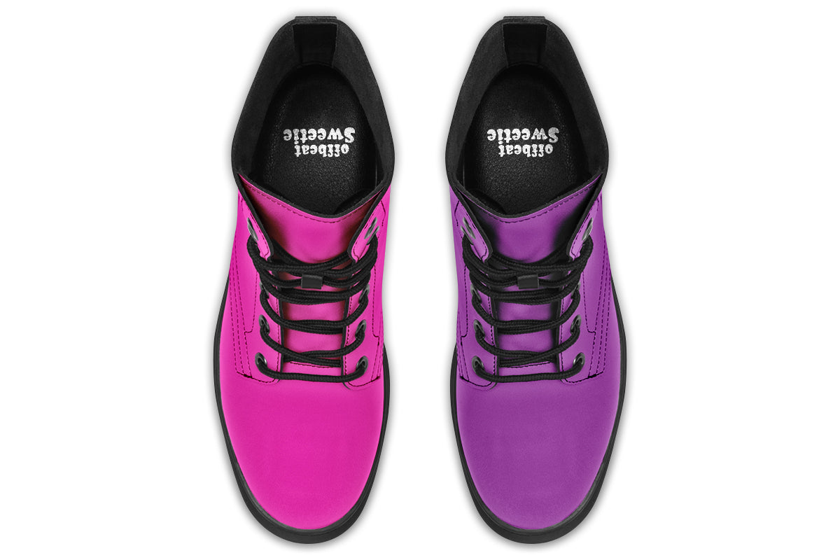 Mismatched boots, one all pink and one all purple.