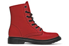 Mismatched boots, one all red and one all purple.
