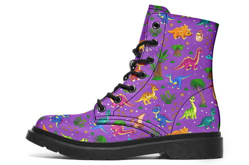 Purple boots with a pattern of different coloured cute baby dinosaurs, prehistoric-looking trees and dinosaur eggs