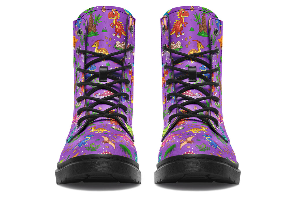 Purple boots with a pattern of different coloured cute baby dinosaurs, prehistoric-looking trees and dinosaur eggs
