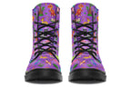 Purple boots with a pattern of different coloured cute baby dinosaurs, prehistoric-looking trees and dinosaur eggs