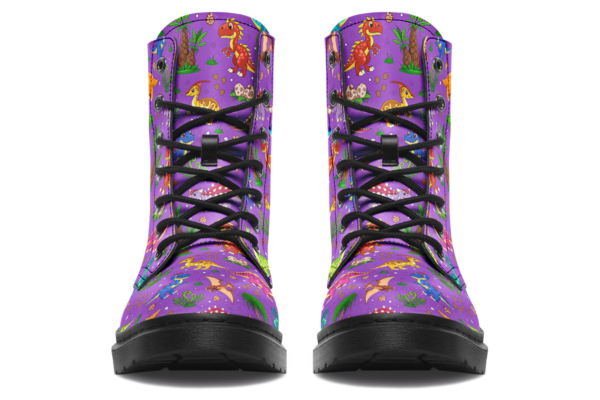Purple boots with a pattern of different coloured cute baby dinosaurs, prehistoric-looking trees and dinosaur eggs