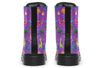 Purple boots with a pattern of different coloured cute baby dinosaurs, prehistoric-looking trees and dinosaur eggs