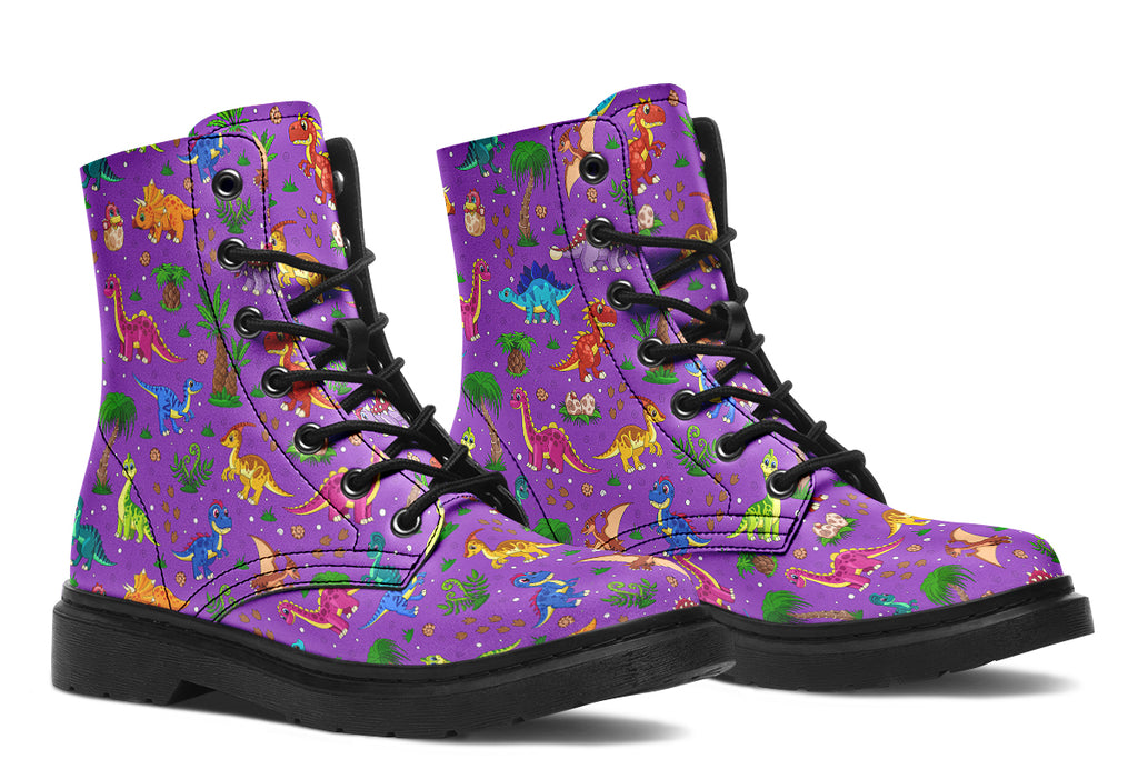 Purple boots with a pattern of different coloured cute baby dinosaurs, prehistoric-looking trees and dinosaur eggs