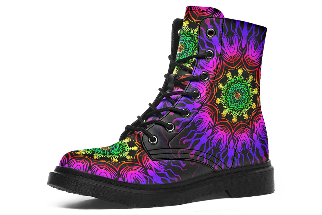 Boots featuring a vibrant, almost neon mandala pattern in a gradient of green, yellow, red, pink and purple on a black background.