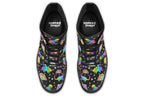 Black boots with colourful rainbow gradient dinosaur pattern