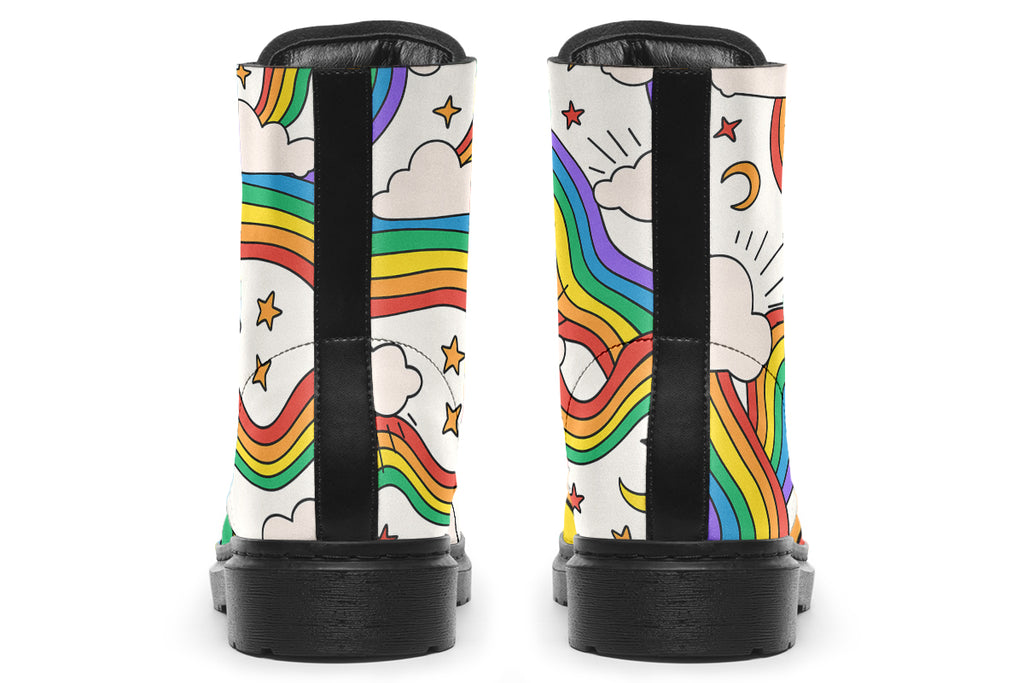 White boots with a pattern of rainbows and clouds