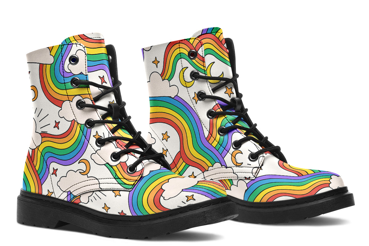 White boots with a pattern of rainbows and clouds
