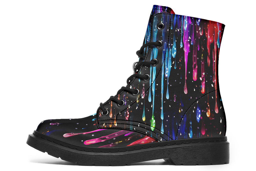 Black boots with a design that looks like different coloured paints dripping down the boots