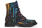 Black boots with a design that looks like different coloured paints dripping down the boots
