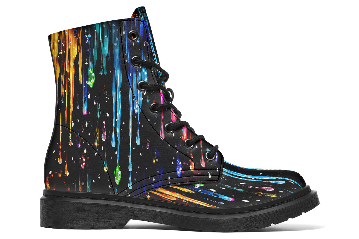 Black boots with a design that looks like different coloured paints dripping down the boots