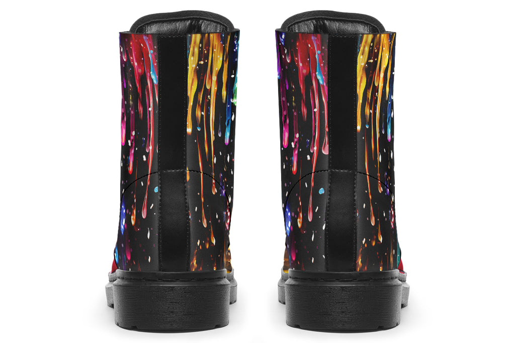 Black boots with a design that looks like different coloured paints dripping down the boots